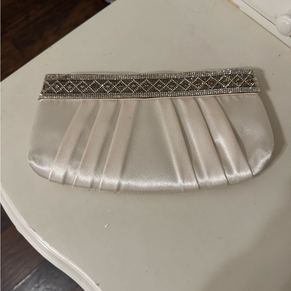 Elegant Cream Clutch with Silver Accents